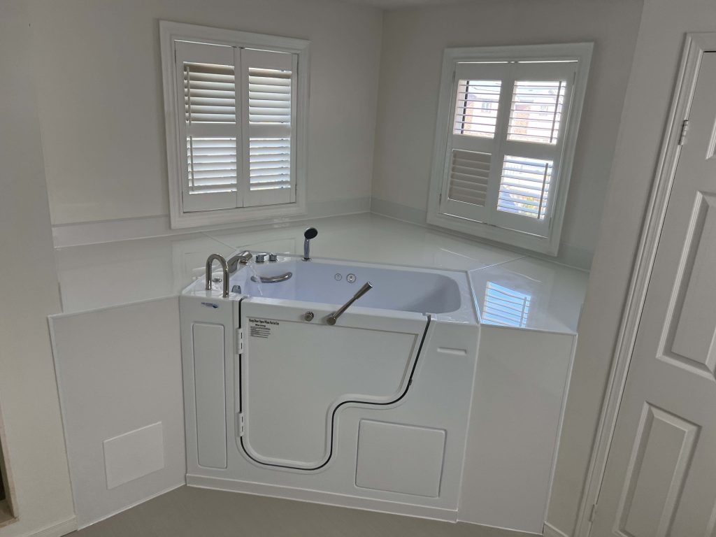 Walk-in bathtub installed in a bright Barrie bathroom