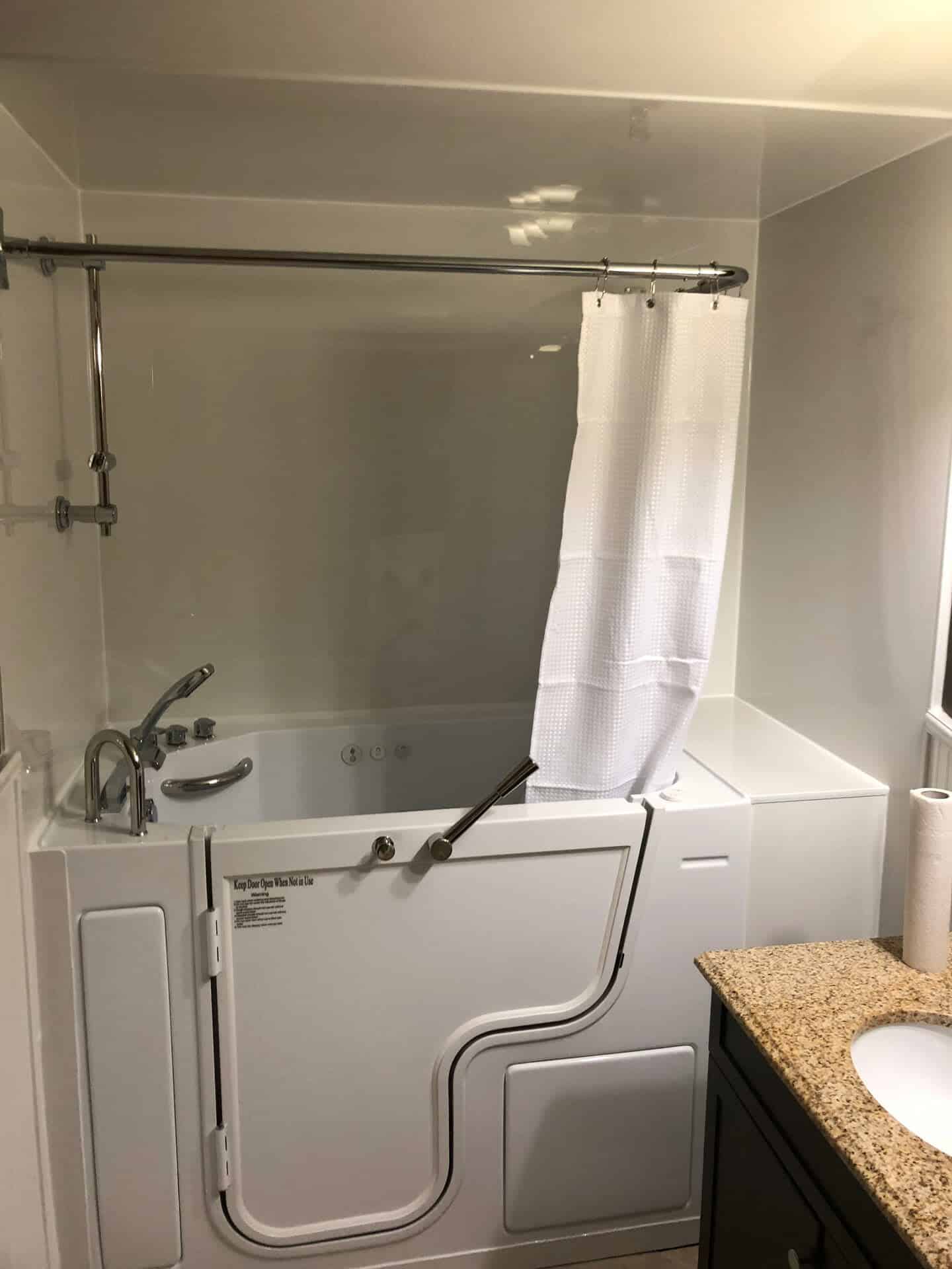 Walk-in bathtub installed by Safe Bathing Canada for accessible bathing